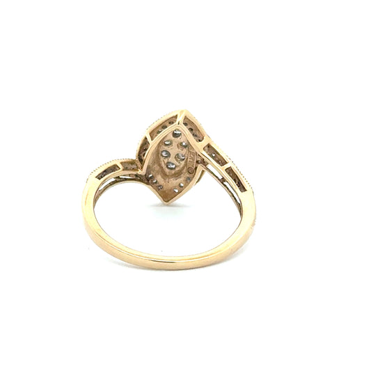 10k Yellow Gold Ring with natural diamonds set in a marquise shape and brilliant accents
