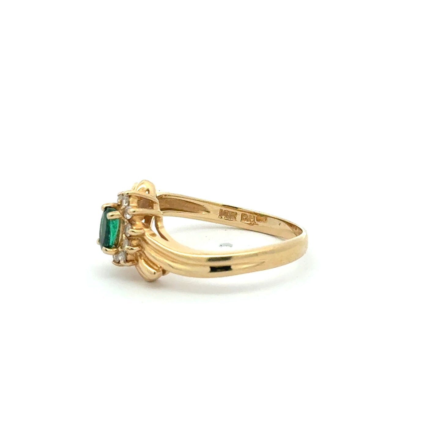 Exquisite multi-stone ring in 14K yellow gold with oval cabochon emerald and natural diamonds