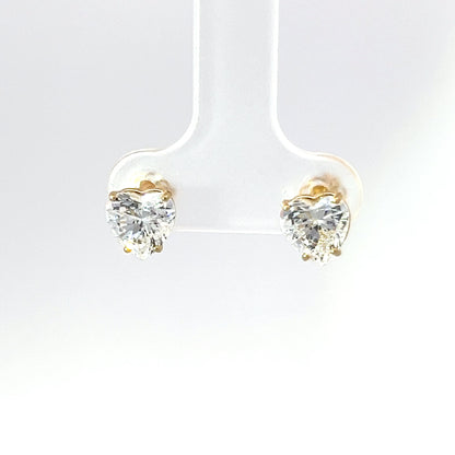 Elegantes pendientes de oro amarillo de 14 quilates con circonita cúbica en forma de corazón