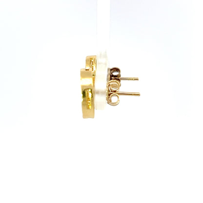 Elegantes aretes durmientes en oro amarillo de 10K con circonitas cúbicas de excelente calidad.