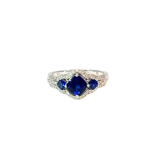 Elegante Anillo Multipiedra de Oro Blanco de 14K con Circonia Azul y Blanca.