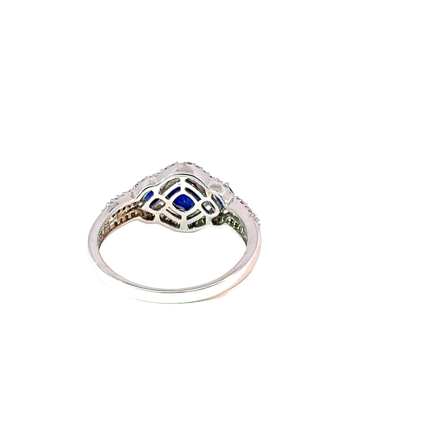 Elegante Anillo Multipiedra de Oro Blanco de 14K con Circonia Azul y Blanca.