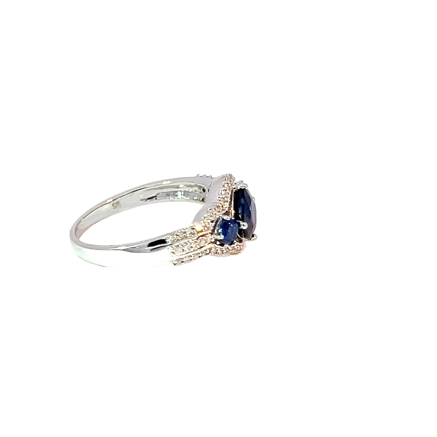 Elegante Anillo Multipiedra de Oro Blanco de 14K con Circonia Azul y Blanca.