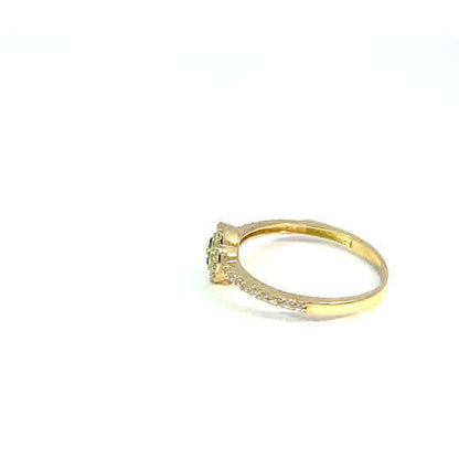 Multi-stone ring in 10K yellow gold with white and green zirconia