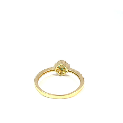Multi-stone ring in 10K yellow gold with white and green zirconia