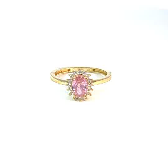 Anillo de oro amarillo de 10K con circonita rosa talla cabujón