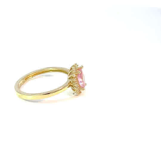 Anillo de oro amarillo de 10K con circonita rosa talla cabujón