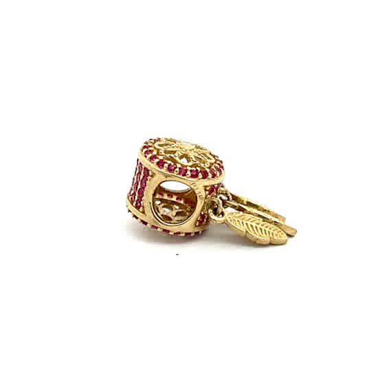 Dije de oro amarillo de 14 quilates con circonitas de talla brillante
