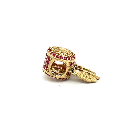 Dije de oro amarillo de 14 quilates con circonitas de talla brillante