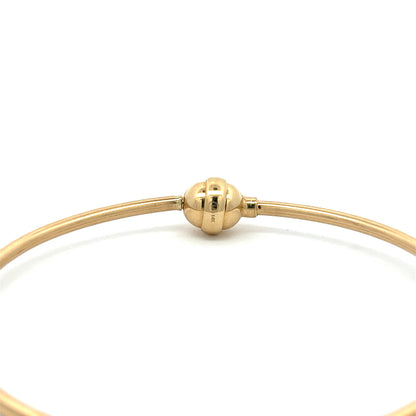 Elegant Bangle bracelet in yellow gold, minimalist design