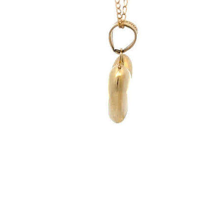 Colgante de oro amarillo de 10 quilates en forma de corazón.
