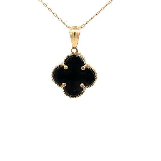 Colgante de oro amarillo de 10k con piedra negra en talla cabujón barroco