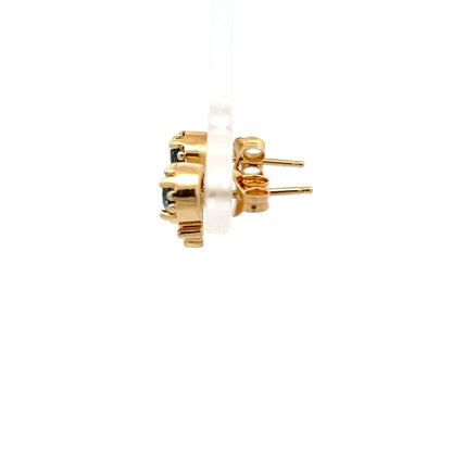Pendientes de oro amarillo de 14k con topacio azul talla brillante