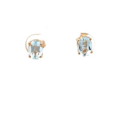 Pendientes de oro amarillo de 14k con aguamarinas talla ovalada brillante