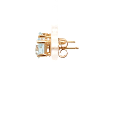 Pendientes de oro amarillo de 14k con aguamarinas talla ovalada brillante