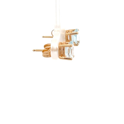 Pendientes de oro amarillo de 14k con aguamarinas talla ovalada brillante