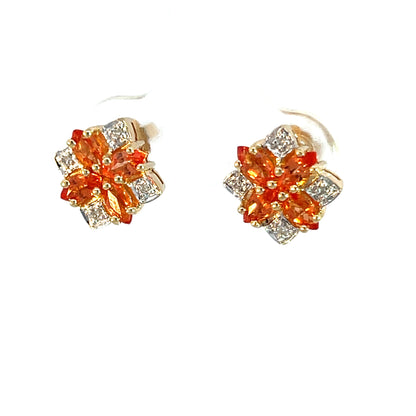 Pendientes de oro amarillo de 14k con topacio azul talla brillante
