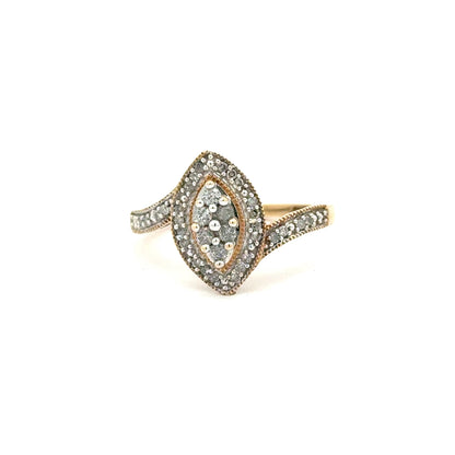 10k Yellow Gold Ring with natural diamonds set in a marquise shape and brilliant accents