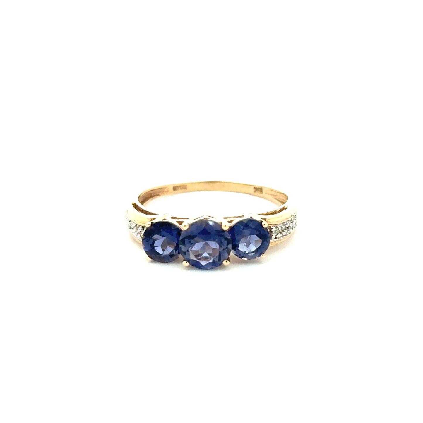 10K yellow gold ring with a trio of tanzanites and small diamonds