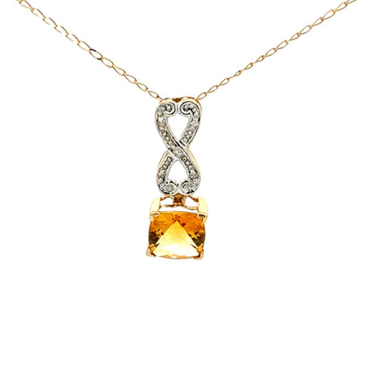 Elegant 10K yellow gold pendant with cushion-cut citrine and small diamonds