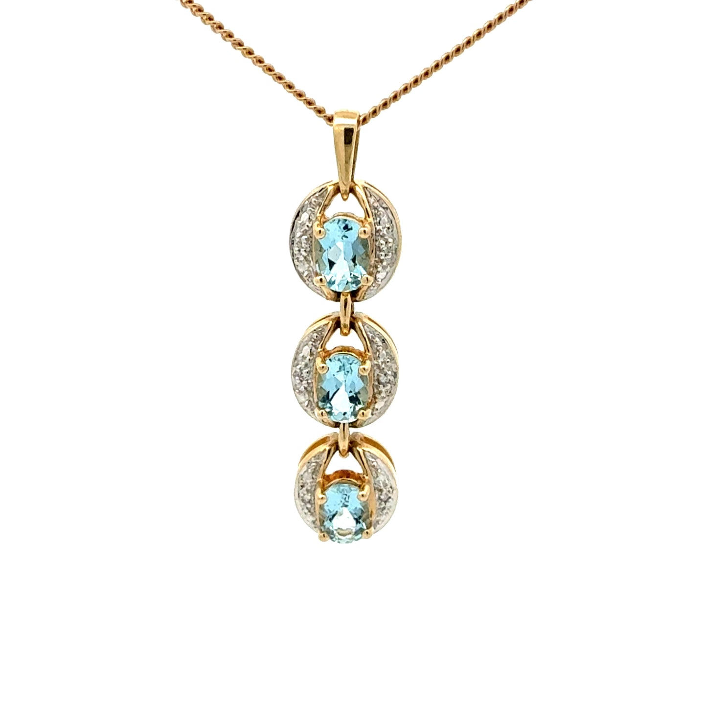 14k gold pendant with three aquamarine stones