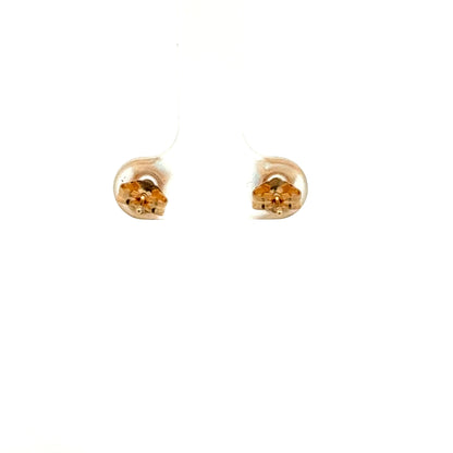 Pendientes de oro amarillo de 14k con topacio azul talla brillante