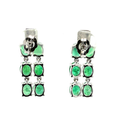 Pendientes de oro amarillo de 14k con topacio azul talla brillante