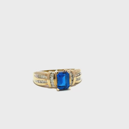10k Yellow Gold Ring with Emerald Cut Blue Cubic Zirconia, Natural Diamonds and Engraved Details
