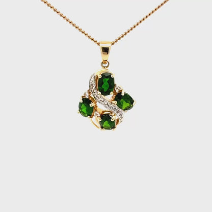 14k gold pendant with peridot and diamond stones