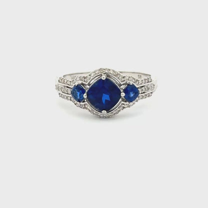 Elegant 14K White Gold Multi-Stone Ring with Blue and White Zirconia.