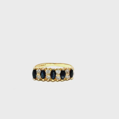 Elegant multi-stone ring in yellow gold with marquise-cut blue sapphires and round natural diamonds