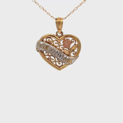 10k Yellow Gold Pendant with heart design and details in white and rose gold.