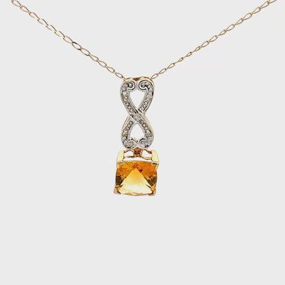 Elegant 10K yellow gold pendant with cushion-cut citrine and small diamonds
