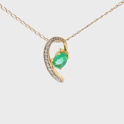 Emerald and diamond pendant, in 14K yellow gold