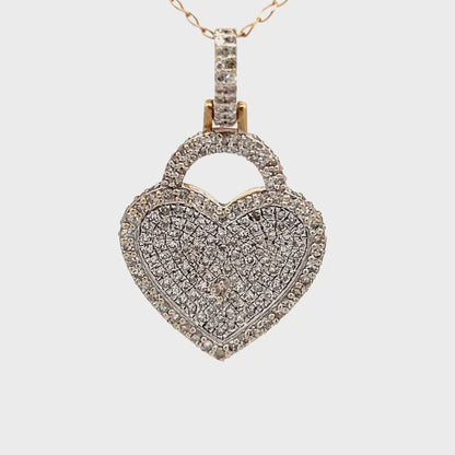 10k Yellow Gold pendant, decorated with natural diamonds.